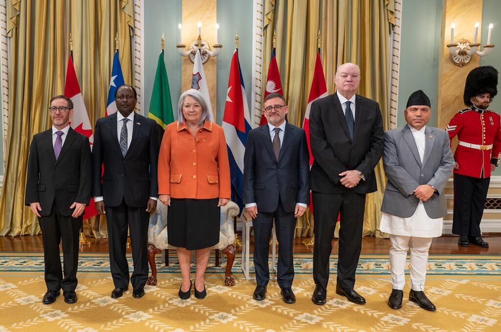 Governor General Mary Simon stands with the new Heads of Mission